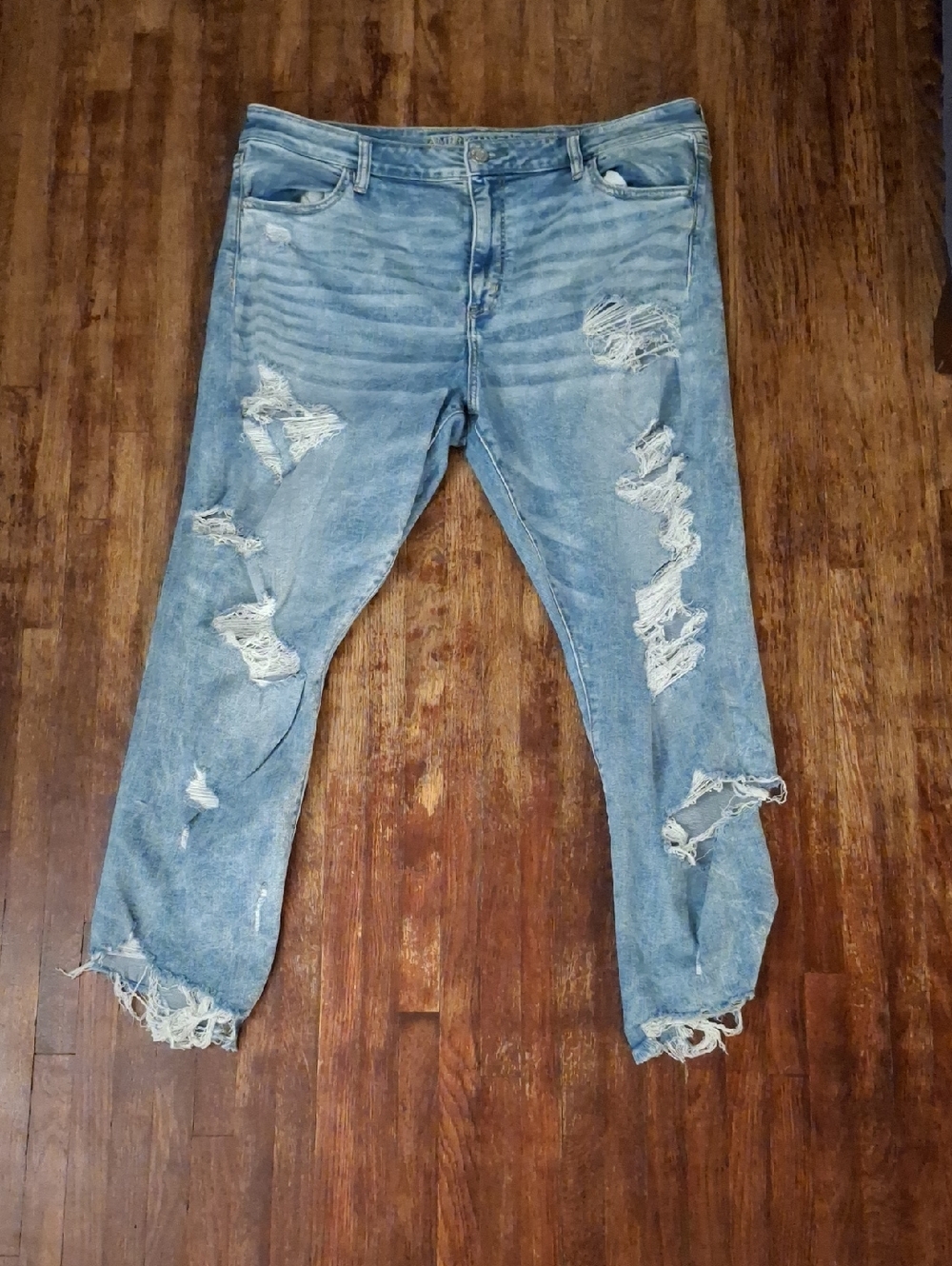 American Eagle AEO Next Level Stretch Light Blue Distressed Hi-Rise Jegging Crop